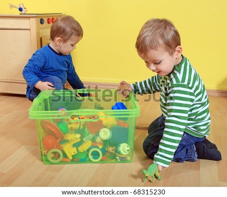 Cute european toddlers in kindergarten.