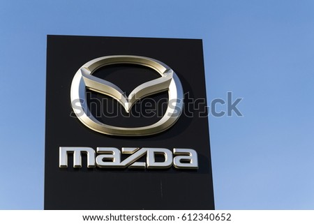 PRAGUE, CZECH REPUBLIC - MARCH 31: Mazda car company logo in front of dealership building on March 31, 2017 in Prague, Czech republic. Mazda set to launch new electric vehicle range by 2019.