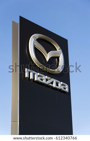 PRAGUE, CZECH REPUBLIC - MARCH 31: Mazda car company logo in front of dealership building on March 31, 2017 in Prague, Czech republic. Mazda set to launch new electric vehicle range by 2019.