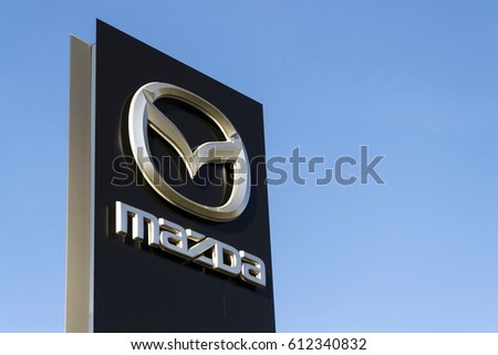 PRAGUE, CZECH REPUBLIC - MARCH 31: Mazda car company logo in front of dealership building on March 31, 2017 in Prague, Czech republic. Mazda set to launch new electric vehicle range by 2019.