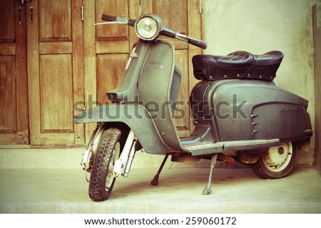 CHIANG MAITHAILAND FEB22 Old Vespa Parked In Front Of A House For CHIANG MAITHAILAND FEB22 Old Vespa Parked In Front Of A House For