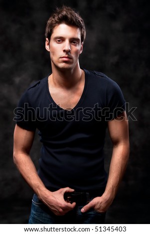 Fashion Shot of a Young Man A trendy European man dressed in contemporary cloth. He is now a professional model.