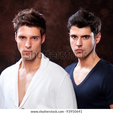 Fashion Shot of a trendy European men dressed in contemporary cloth. They are now a professional models.