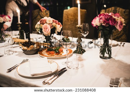 [fb] les angélus // jola&monsiame Stock-photo-served-table-set-with-flowers-and-empty-wine-glasses-in-french-restaurant-231088408