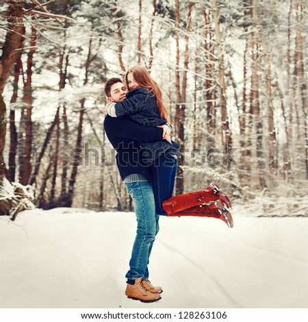 https://thumb9.shutterstock.com/display_pic_with_logo/952708/128263106/stock-photo-young-couple-having-fun-outdoor-in-winter-128263106.jpg