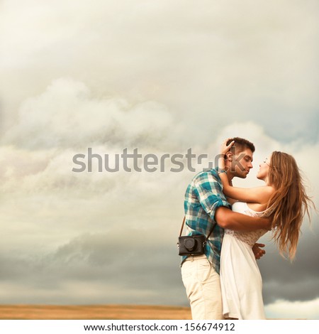 https://thumb9.shutterstock.com/display_pic_with_logo/952708/156674912/stock-photo-young-beautiful-couple-in-love-standing-together-in-summer-evening-in-countryside-on-the-corn-field-156674912.jpg