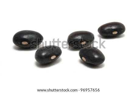 Five Black Beans Isolated On White