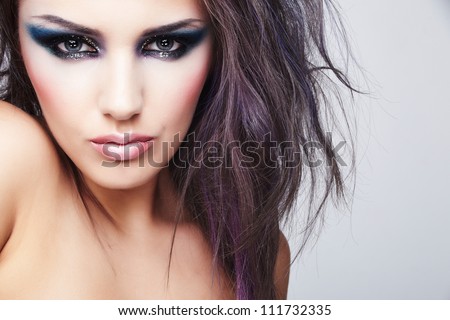 https://thumb9.shutterstock.com/display_pic_with_logo/97842/111732335/stock-photo-portrait-of-beautiful-young-woman-with-long-colored-brown-hair-and-bright-make-up-111732335.jpg