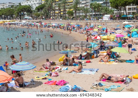 heatwave beach crowded holidaymakers cannes france august sunbathing summer shutterstock heat cooling sea during