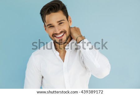Portrait of sexy smiling male model