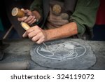 Craftsman Hands Working On A...