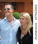 Small photo of GIVRINS, SWITZERLAND - JULY 14: Formula One racing driver Michael Schumacher with his wife Corinna during the CS CLASSIC 12 celebrity horse reigning event on July 14, 2012 in Givrins VD, Switzerland