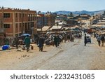 Small photo of DEBARK, ETHIOPIA - JANUARY 2018: Traffic on the main road leading through Debark in Ethiopia.