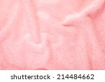 soft pink texture of bath towel folded as a background