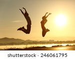 Fitness Couple Jumping Happy At ...