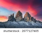 Incredible view of the Three Peaks of Lavaredo on sunset time. National Park Tre Cime di Lavaredo, Dolomite Alps mountains, Trentino Alto Adige region, Sudtirol, Dolomites, Italy