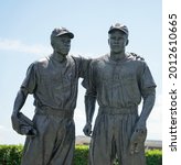 Small photo of BROOKLYN, NEW YORK - MAY 11, 2021: Jackie Robinson and Pee Wee Reese Statue in front of MCU ballpark in Brooklyn