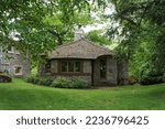 Small photo of CHARLEVOIX, MICHIGAN - AUGUST 3, 2022: The Betide House, famous mushroom house designed by Earl Young, in Charlevoix, Michigan
