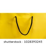 yellow paper shopping bag... | Shutterstock . vector #1028393245