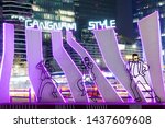 Small photo of SEOUL, SOUTH KOREA - APRIL 15, 2019 : Night shot of the famous psy korean singer lighted dancing silhouettes in gangnam square.