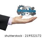 gears with the text wordpress over a businessman hand