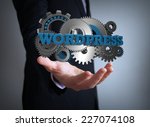 programming concept: text wordpress with gears over businessman hand