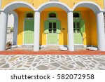 Neoclassic Style Yellow House...