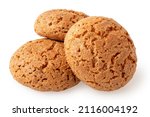 Three whole amaretti biscuits isolated on white.