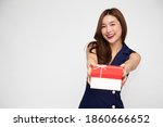 Happy beautiful Asian woman smile with red gift box isolated on white background. Teenage girls in love, Receiving gifts from lovers. New Year, Christmas and Valentines Day concept
