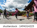Small photo of Atlanta, GA / USA - September 15, 2018: A woman jumps rope double dutch style at the Pretty Girls Sweat Fest fitness event, on September 15, 2018 in Atlanta, GA.