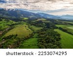 Beautiful view of Western and High Tatras Mountains in Slovakia. Green landscape and hills. Aerial drone photography.