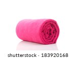 Rolled up pink towel isolated on white