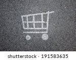 Shopping cart symbol on road background