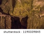 Small photo of Underground Quarry Zedekiah's Cave, Solomon's Quarries with Hands Markings on the Wall