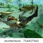 A 3-D illustration of a typical scene from a Devonian Period (419.2 million years ago) sea and shoreline. The Eurypterids feed on the smaller Trilobites while the Dunkleosteus, in turn, feeds on them.