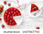 Delicious strawberry tart on white wooden background, top view