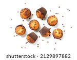 Chocolate chip muffins isolated on white background. top view	
