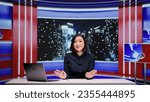 Small photo of Media broadcaster hosting talk show late at night, discussing about important global events on live television program. Asian woman working as journalist with entertainment tv segment.