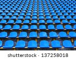 amphitheater of dark blue seats abstract background
