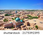 Beautiful aerial view of the 2500-year-old uzbek city Khiva. Ancient Itchan Kala fortress, Mosque, market and houses in Historic Center of Khiva  (UNESCO World Heritage Site), Uzbekistan, Central Asia