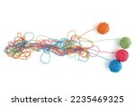 Small photo of Tangled colorful cotton threads and balls isolated on white background. Abstract thread lines chaos pattern.