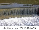 Small photo of WEIR WITH WATER CASCADE AT OTTER DAM IN RIETVLEI GAME RESERVE