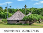 Small photo of Traditional Kanak houses on Ouvea Island, Loyalty Islands, New Caledonia. Kanak are the indigenous Melanesian inhabitants of New Caledonia.