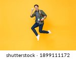 young handsome asian tourist... | Shutterstock . vector #1899111172