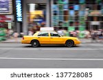 Panning shot of a taxicab at Times Square in New York, USA.