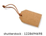 brown cardboard label with slim genuine leather cord,isolated