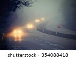 Cars in the fog