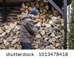 Caucasian Man Taking Firewood...
