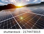 Small photo of Solar panels on factory roof photovoltaic solar panels absorb sunlight as a source of energy to generate electricity creating sustainable energy