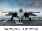 An f 14 jet fighter on an...
